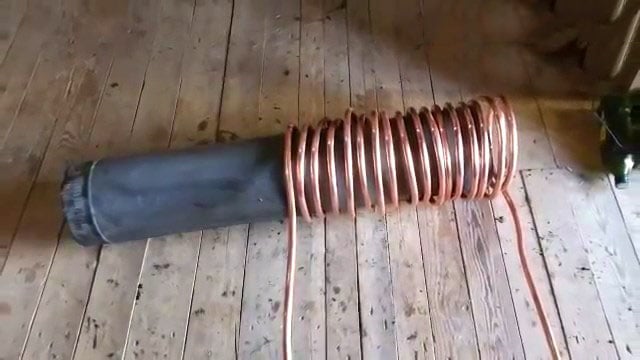 How to build an Off grid  Rocket Mass Stove Hot Water heater using Copper Coils, Clay ,Sand. Also works as a cooktop!!!