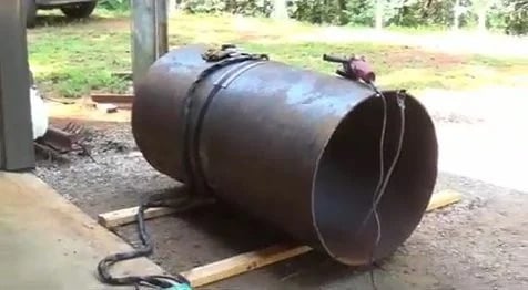 How to build a Simple Homemade Wood Burning Stove heater with Heat Exchanger for your Garage .No Electricity required and Inexpensive…..