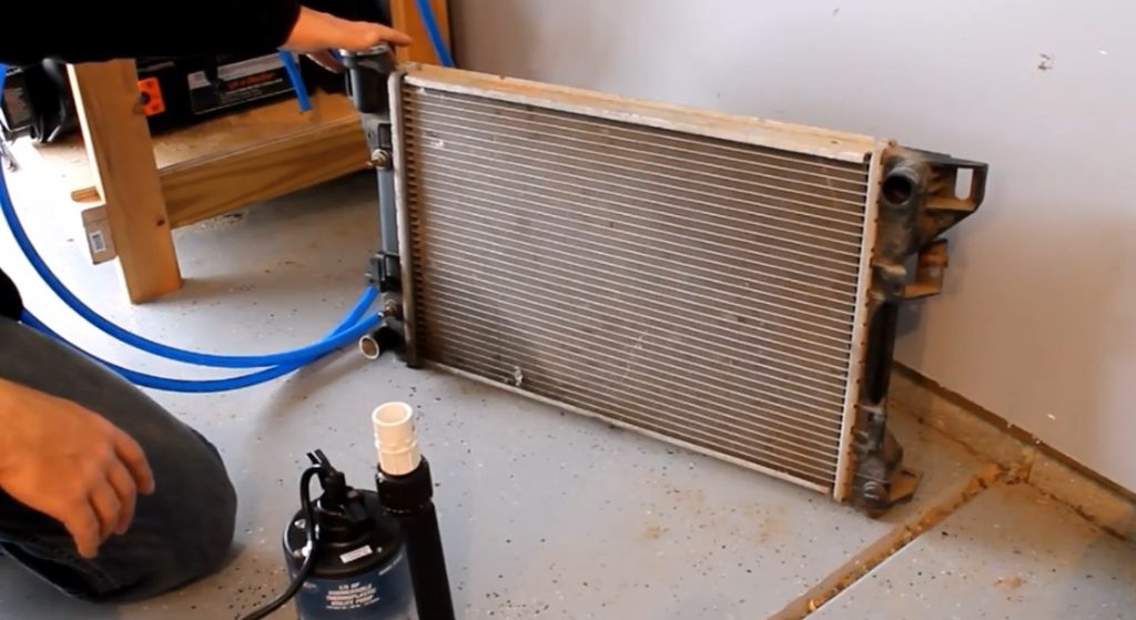 How to heat your Garage by using an Outdoor Wood Burning Boiler and an