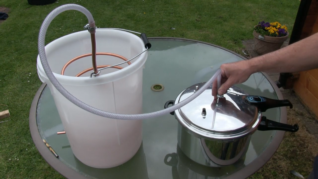 How to build a Simple and Effective Homemade Water Distiller from Simple Materials . Also works as an Essential Oil Distiller